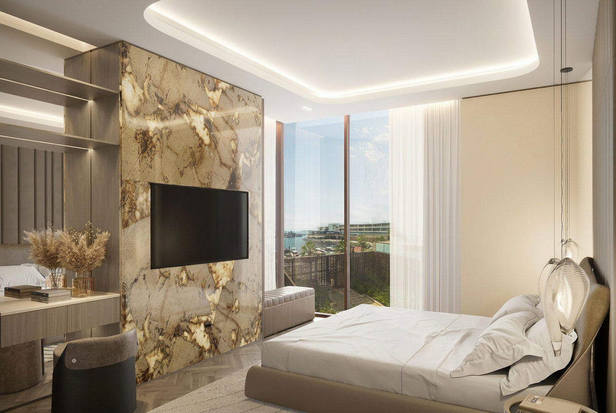 Primary bedroom with book-matched quartzite feature wall